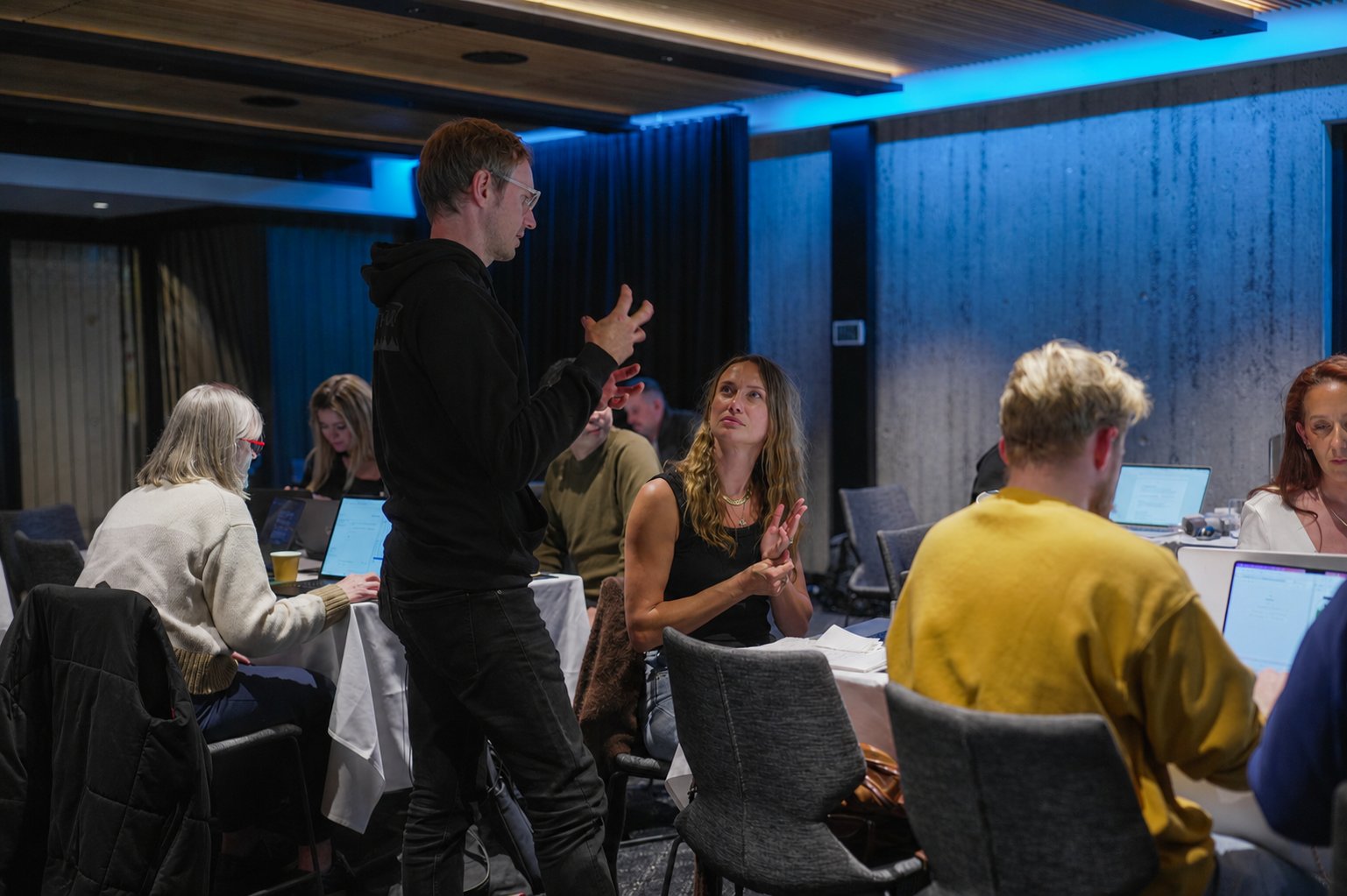 One-on-one mentoring at a Team 400 Claude AI training workshop in Sydney